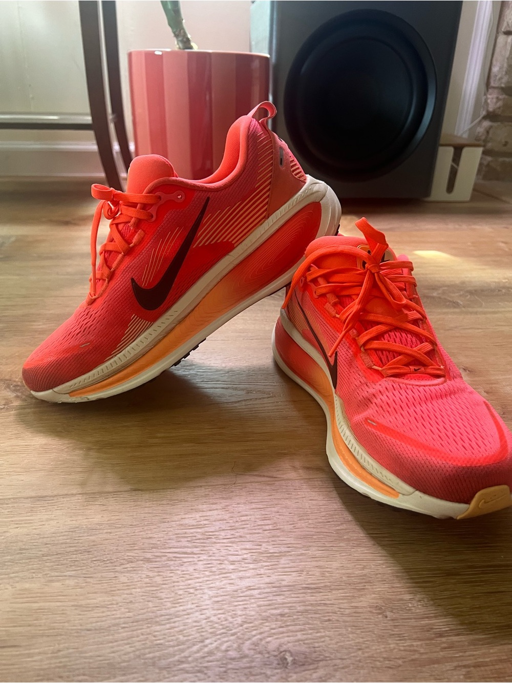 Nike Women’s Vomero 18 Shoes in Bright Orange with Black Swoosh
